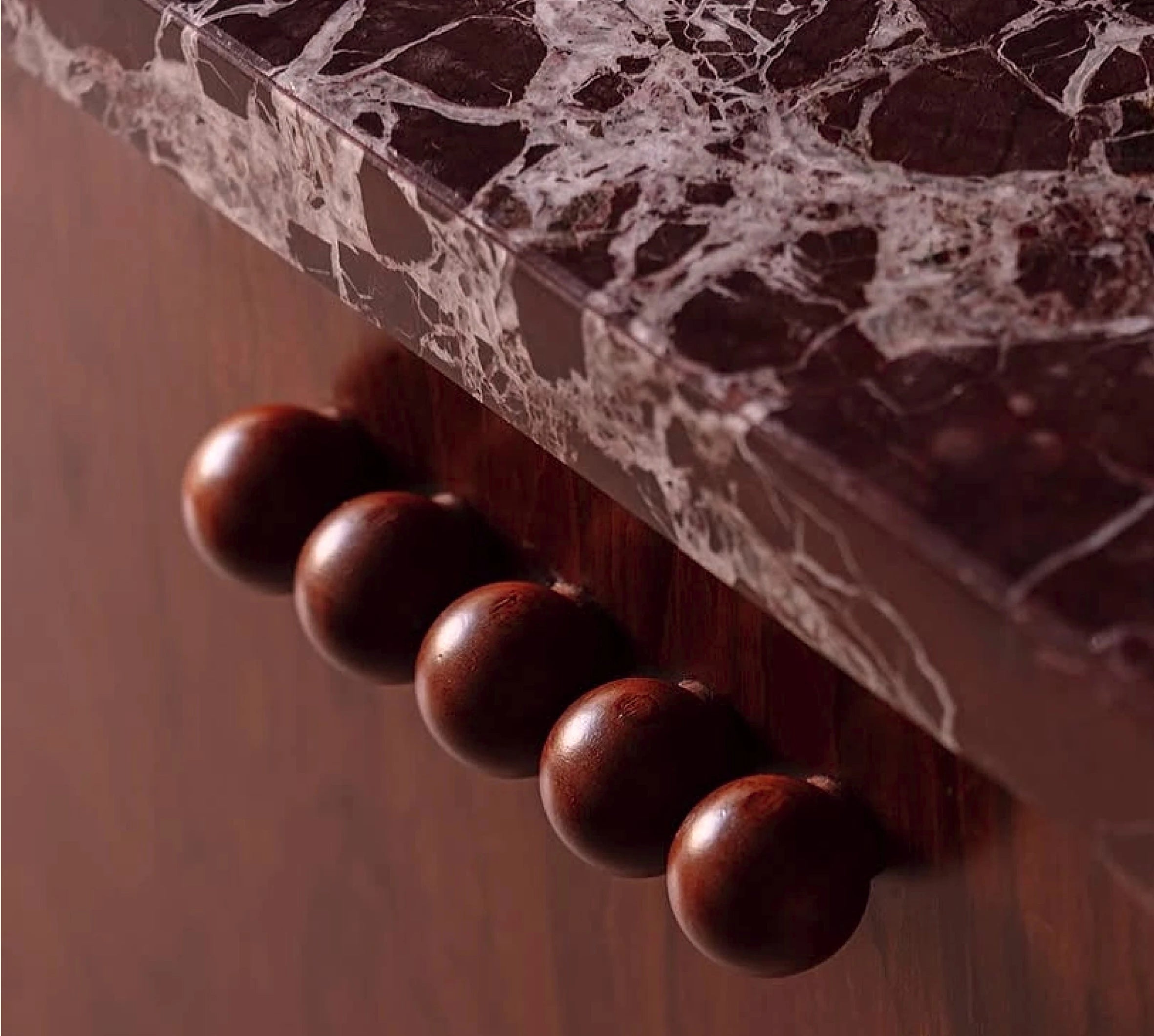 Round ATHAR knobs on marble furniture